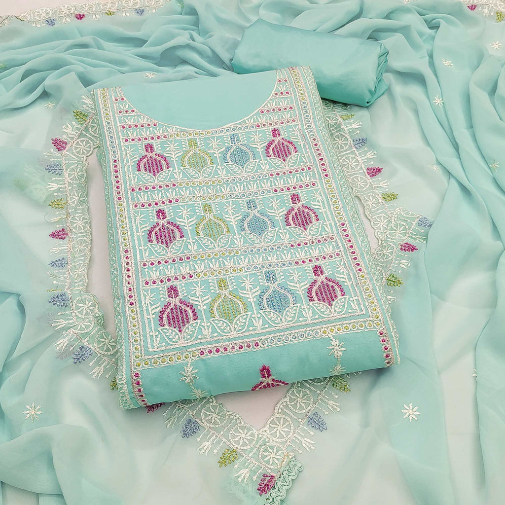 Sophisticated Turquoise Georgette Dress Material Accented With Ornate Floral Thread Embroidery